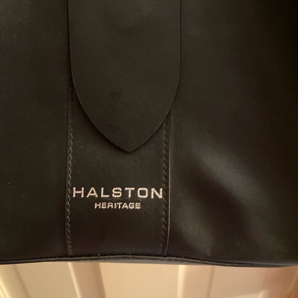 Never used ! Beautiful inside inside and out day to night bag
